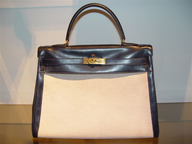 DECADES INC.: Hermes 35 cm Toile and Navy Kelly